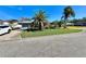 House exterior with boat and lush landscaping at 1424 Breaks Way, Port Orange, FL 32127