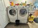 Garage laundry room with Samsung washer and dryer at 1424 Breaks Way, Port Orange, FL 32127