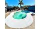 Kidney shaped swimming pool with white coping and decking at 1424 Breaks Way, Port Orange, FL 32127