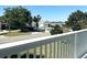 Neighborhood view from deck, showcasing homes and landscaping at 15 Richmond Dr, New Smyrna Beach, FL 32169