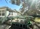 Wooden deck with railing overlooking the backyard at 1506 Palmetto St, New Smyrna Beach, FL 32168