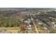 Aerial view showing home's location in a residential neighborhood at 1596 Elizabeth St, New Smyrna Beach, FL 32168