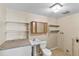 Bathroom with granite countertop and pedestal sink at 1596 Elizabeth St, New Smyrna Beach, FL 32168