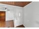 Entryway with white door and wood flooring at 1596 Elizabeth St, New Smyrna Beach, FL 32168