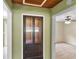 Hallway with built-in storage cabinet at 1596 Elizabeth St, New Smyrna Beach, FL 32168