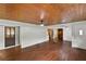 Bright living room with wood flooring and ceiling fan at 1596 Elizabeth St, New Smyrna Beach, FL 32168