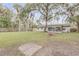 Spacious backyard perfect for outdoor fun at 1622 Pine Tree Dr, Edgewater, FL 32132