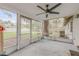 Relaxing screened porch overlooking the backyard at 1622 Pine Tree Dr, Edgewater, FL 32132