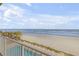 Oceanfront balcony with pool and beach views at 1705 S Atlantic Ave # 302, New Smyrna Beach, FL 32169