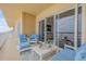 Balcony with outdoor seating and ocean views at 1705 S Atlantic Ave # 302, New Smyrna Beach, FL 32169