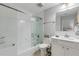 Clean bathroom with a shower/tub combo, toilet and vanity at 1705 S Atlantic Ave # 302, New Smyrna Beach, FL 32169