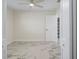 Bedroom with ceiling fan and double door closet at 1852 Sabal Palm Dr, Edgewater, FL 32141