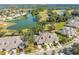 Aerial view of house and surrounding golf course community at 1938 Turnbull Lakes Dr, New Smyrna Beach, FL 32168