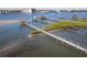 Elevated view of waterfront property with multiple docks and boat houses at 2 Richmond Dr, New Smyrna Beach, FL 32169