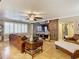 Living room with leather sofas and barn-door accent wall at 2 Richmond Dr, New Smyrna Beach, FL 32169