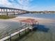 Quaint gazebo on a private sandy islet, offering serene water views at 2 Richmond Dr, New Smyrna Beach, FL 32169