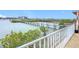 Private dock and walkway extending over calm water with mangrove trees at 2 Richmond Dr, New Smyrna Beach, FL 32169