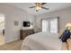 Spacious bedroom with mounted TV and dresser at 201 S Cooper St, New Smyrna Beach, FL 32169