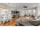 Open concept living room and dining area with hardwood floors at 201 S Cooper St, New Smyrna Beach, FL 32169