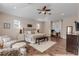 Spacious main bedroom with hardwood floors and ceiling fan at 201 S Cooper St, New Smyrna Beach, FL 32169