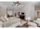 Main bedroom with hardwood floors and a large bed at 201 S Cooper St, New Smyrna Beach, FL 32169