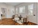 Cozy sitting area with hardwood floors and two armchairs at 201 S Cooper St, New Smyrna Beach, FL 32169