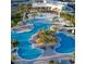 Aerial view of resort-style pool with lounge chairs and cabanas at 205 Blue Starfish Pl, Daytona Beach, FL 32124