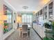 Elegant dining room featuring a large table and built-in cabinetry at 205 Blue Starfish Pl, Daytona Beach, FL 32124