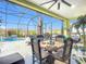 Outdoor patio with seating and a view of the refreshing pool at 205 Blue Starfish Pl, Daytona Beach, FL 32124