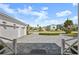 View of the home's driveway and two-car garage at 2302 S Atlantic Ave, New Smyrna Beach, FL 32169