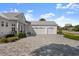 Three-car garage and expansive driveway at 2302 S Atlantic Ave, New Smyrna Beach, FL 32169