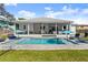 Inviting pool and patio; perfect for outdoor entertaining at 2302 S Atlantic Ave, New Smyrna Beach, FL 32169