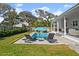 Relaxing pool area with lounge chairs and umbrellas at 2302 S Atlantic Ave, New Smyrna Beach, FL 32169