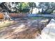 Large backyard with grassy area, playset and firepit at 2309 Lime Tree Dr, Edgewater, FL 32141