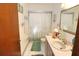 Clean bathroom with shower/tub combo and updated vanity at 2309 Lime Tree Dr, Edgewater, FL 32141