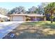 Ranch style home with attached garage and spacious yard at 2309 Lime Tree Dr, Edgewater, FL 32141