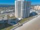 Aerial view of beachfront highrise building, pool, and beach at 2545 S Atlantic Ave # Ph4, Daytona Beach, FL 32118