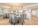 Elegant dining room with glass table and wicker chairs at 2545 S Atlantic Ave # Ph4, Daytona Beach, FL 32118