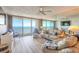 Living room with ocean view, light flooring, and comfortable seating at 2545 S Atlantic Ave # Ph4, Daytona Beach, FL 32118