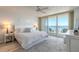 Main bedroom with ocean view and king-size bed at 2545 S Atlantic Ave # Ph4, Daytona Beach, FL 32118