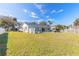 Spacious backyard with large grassy area at 2717 Needle Palm Dr, Edgewater, FL 32141