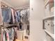 Walk-in closet with ample shelving and hanging space for clothes at 2717 Needle Palm Dr, Edgewater, FL 32141