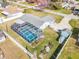 Aerial view of house and pool at 2720 Queen Palm Dr, Edgewater, FL 32141