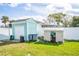 Backyard with storage sheds at 2720 Queen Palm Dr, Edgewater, FL 32141