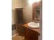 Clean bathroom with vanity, sink, and large mirror at 2723 Juniper Dr, Edgewater, FL 32141