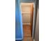 Open closet with wire shelving and wood-look flooring at 2723 Juniper Dr, Edgewater, FL 32141