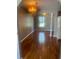 Dining room featuring wood-look flooring and a chandelier at 2723 Juniper Dr, Edgewater, FL 32141