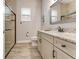 Bathroom with granite countertop vanity and large shower at 2824 S Asciano Ct, New Smyrna Beach, FL 32168