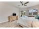 Spacious bedroom with wood-look floors and pool view at 2824 S Asciano Ct, New Smyrna Beach, FL 32168