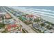 Aerial view of beachfront property and road at 3001 S Atlantic Ave # 501, New Smyrna Beach, FL 32169